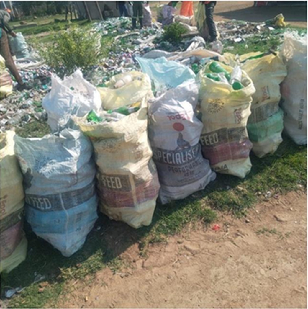 Community collectors with bagged recyclables creating livelihoods through Skotane Trading